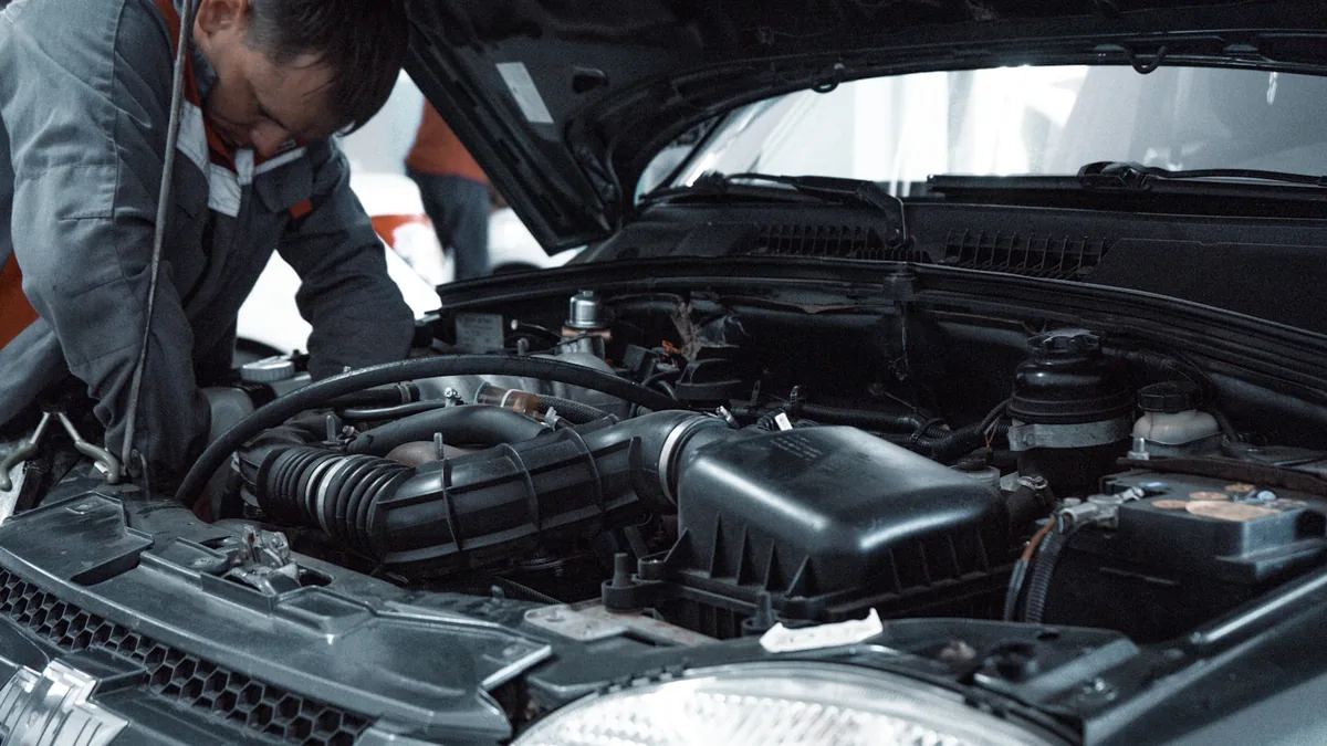 A technician checking the charging system and battery on a car engine